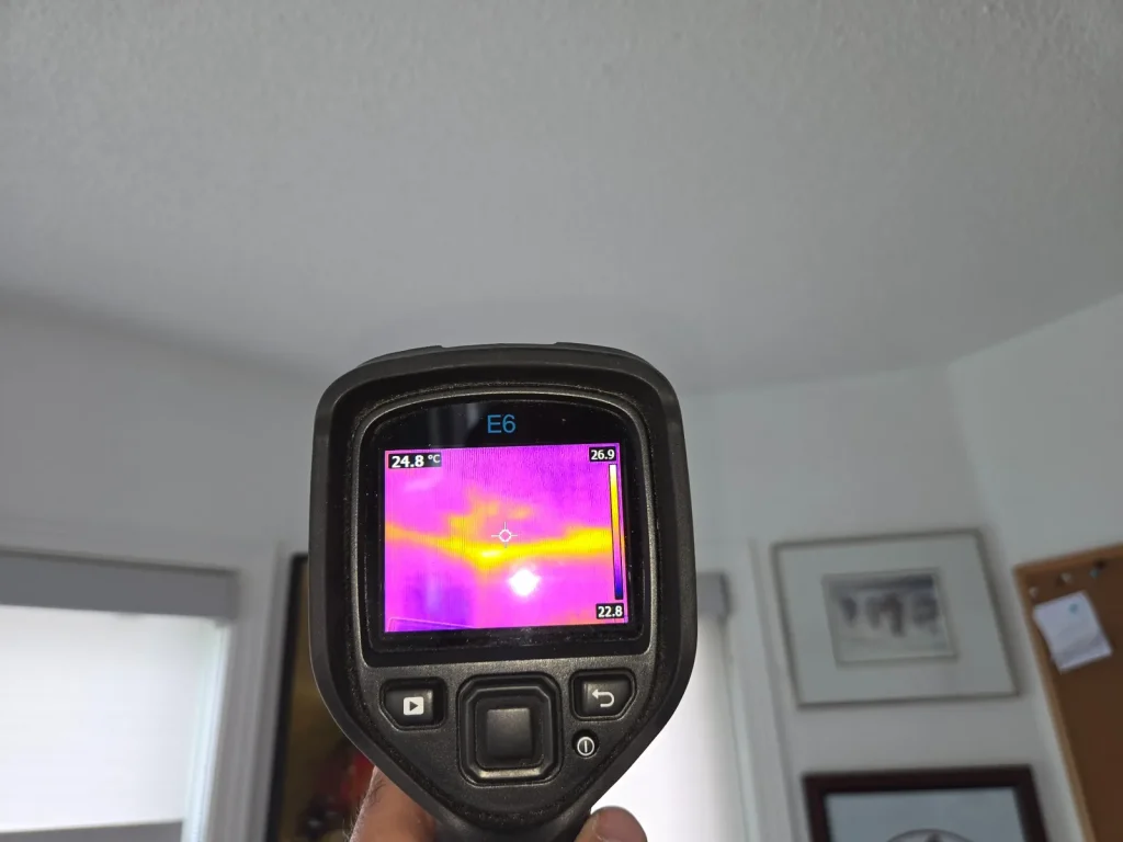 Loose-fill attic insulation viewed during a residential home inspection